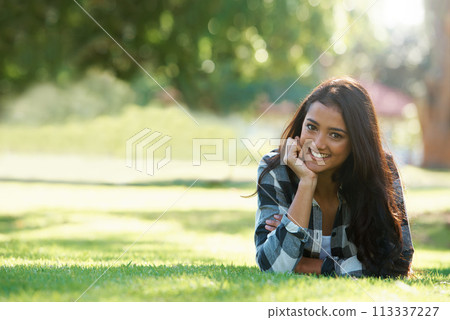 Space, portrait or happy woman on grass to relax for rest in park, nature or field for peace. Mockup, travel or female person on break with smile on outdoor summer vacation or holiday on lawn in USA Space, portrait or happy woman on grass to relax for rest in park, nature or field for peace. Mockup, travel or female person on break with smile on outdoor summer vacation or holiday on lawn in USA 113337227