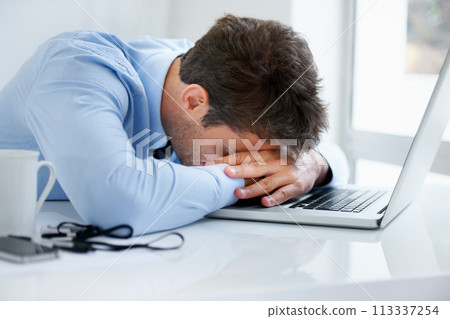 Businessman, sleeping and tired at work, burnout and exhausted or mental health, desk and overwhelmed. Male person, dreaming and lazy in office, resting and fatigue or low energy, coffee and nap Businessman, sleeping and tired at work, burnout and exhausted or mental health, desk and overwhelmed. Male person, dreaming and lazy in office, resting and fatigue or low energy, coffee and nap 113337254