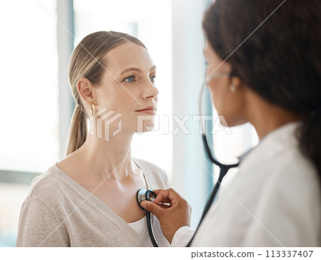 Doctor listening to stethoscope heartbeat, patient breathing and lungs for healthcare checkup, test and consulting in hospital. Woman with medical screening from cardiology physician for tuberculosis 113337407