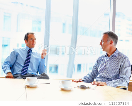 Meeting, discussion and business men in office for management conversation, talking and planning. Corporate workers, teamwork and people in conference room for strategy, collaboration and working 113337524