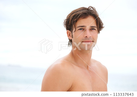 Man, shirtless and thinking on beach relax summer vacation, sea salt hair and sunshine. Male person, muscle and thoughts for travel happy our outdoor holiday, wondering tourist or fresh nature air 113337643