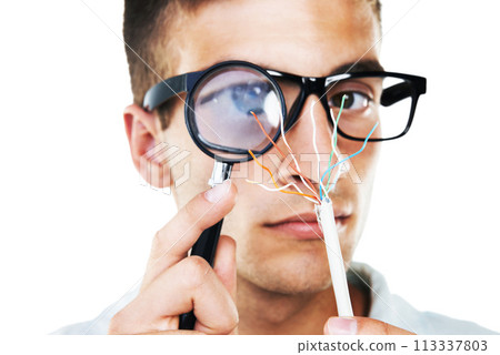 Electrician, cables and portrait of man with test, analysis and check with magnifying glass in white background. Studio, technician or working with electricity, wires or search for solution and power 113337803