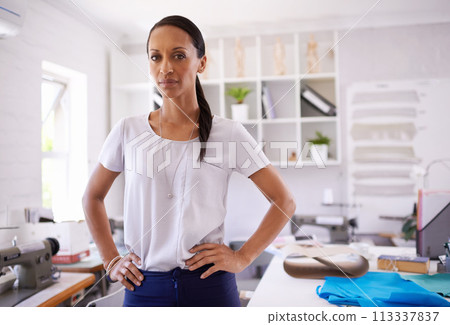 Entrepreneur, design and portrait for businesswoman, fashion in home studio for proud or creative startup career. Confidence, professional for seamstress and female person or fabric in workspace 113337837