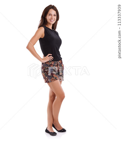 Portrait, fashion and happy with trendy woman in studio isolated on white background for style. Model, clothes and smile with young natural person looking confident in clothing or shorts outfit Portrait, fashion and happy with trendy woman in studio isolated on white background for style. Model, clothes and smile with young natural person looking confident in clothing or shorts outfit 113337939