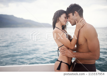 Love, couple and touch forehead at sea for vacation, holiday or travel together on boat in summer. Man, woman and intimate at ocean for connection, care or adventure by water outdoor on mockup space 113337954