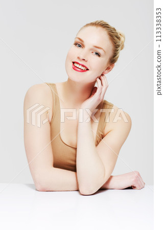 Portrait of happy woman, facial or skincare for wellness with cosmetics, aesthetic or healthy glow. Dermatology, studio or confident model with pride, smile or beauty results on white background 113338353