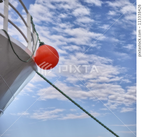 Buoy, ship and travel with transportation and blue sky, nature and fresh air, vacation or journey on cruise with safety for sailing. Boat, yacht for sea voyage or adventure, luxury and life preserver 113338426