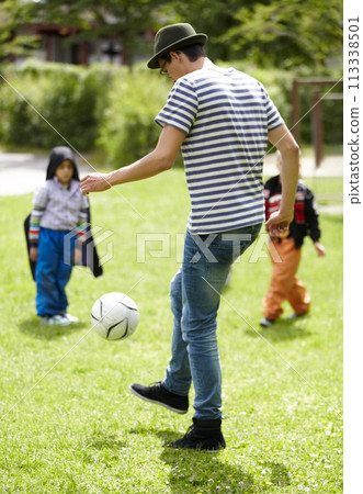 Kindergarten, teacher and playing football with children on grass, lawn or field with game or sport. Soccer, ball or kids with man training to kick or play on playground with fun exercise or activity Kindergarten, teacher and playing football with children on grass, lawn or field with game or sport. Soccer, ball or kids with man training to kick or play on playground with fun exercise or activity 113338501