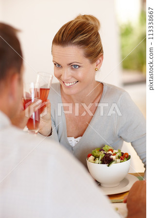 Smile, woman and salad for eating, nutrition or food at restaurant, cafe and table for date with man. Female person, happiness and girl with vegetables for health, wellness or clean diet with husband 113338667