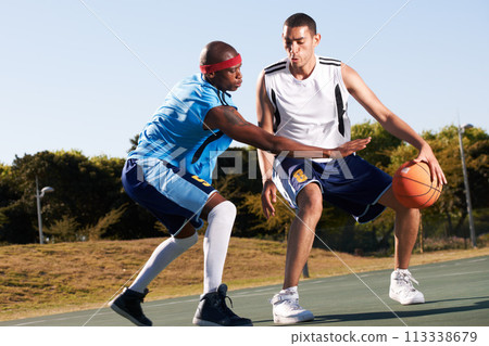 Men, player and basketball game or defense in court challenge team, dunk on rival. Male people, running dribble and score point in summer park in fitness clothes for competition, athlete for winning 113338679