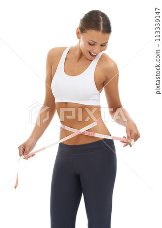 Woman, lose weight and happy with results on measuring tape in studio or white background. Fitness, check and person reading measurement and size of body for health, wellness and progress in goals Woman, lose weight and happy with results on measuring tape in studio or white background. Fitness, check and person reading measurement and size of body for health, wellness and progress in goals 113339147