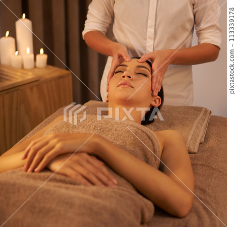 Relax, face massage and female person at spa, treatment and wellness for holistic care. Calm, peace and mindset for stress relief with facial for skincare, beauty salon and masseur for selfcare glow 113339178