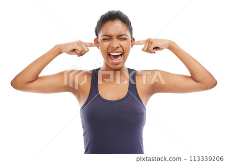 Scream, shouting and fingers in ears with a woman in studio isolated on a white background to block sound. Frustrated, yelling and eyes closed with an angry young person closeup to stop loud noise 113339206