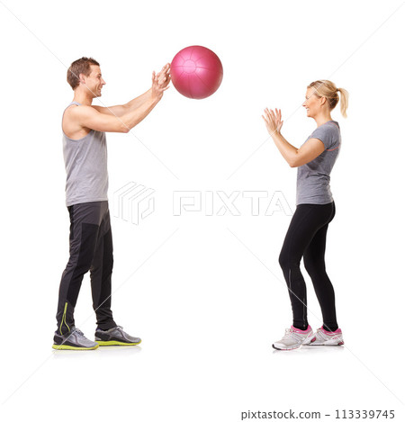 Fitness, man and woman with gym ball with coaching in exercise, body wellness and support. Sports workout, girl and personal trainer with sphere for balance, training and power on white background. 113339745