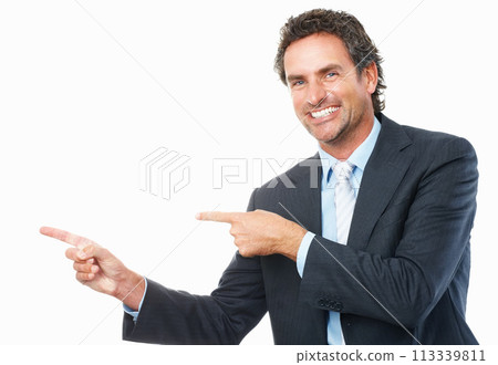 Portrait, happy business man and pointing to space for advertising news, deal or mockup in studio on white background. Mature entrepreneur, presentation and vote for feedback of promotion coming soon Portrait, happy business man and pointing to space for advertising news, deal or mockup in studio on white background. Mature entrepreneur, presentation and vote for feedback of promotion coming soon 113339811