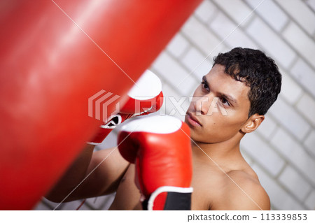 Sport, punching bag or training man, boxer or fighter serious for martial arts contest, kickboxing competition or club challenge. MMA battle, gym equipment or warrior practice skills for boxing fight Sport, punching bag or training man, boxer or fighter serious for martial arts contest, kickboxing competition or club challenge. MMA battle, gym equipment or warrior practice skills for boxing fight 113339853