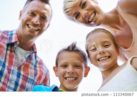 Portrait, low angle and family with smile, happiness and bonding together with weekend break. Face, parents and mother with father and children with fun and cheerful with kids and joyful with summer Portrait, low angle and family with smile, happiness and bonding together with weekend break. Face, parents and mother with father and children with fun and cheerful with kids and joyful with summer 113340067