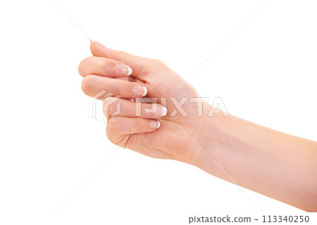 Woman, hand and manicure for polish, french nails and cosmetic care, skincare and beauty. White background, wellness and treatment for hygiene, closeup and fist for arm, studio backdrop and clean 113340250