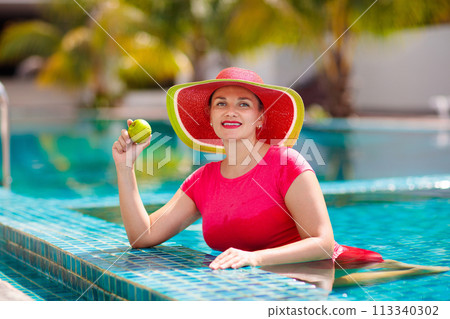Pregnant woman in swimming pool. Healthy pregnancy Pregnant woman in swimming pool. Healthy pregnancy 113340302