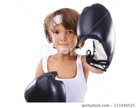Boxing, fist and portrait of child in fight with courage and learning martial arts in white background. Challenge, boxer or kid with training in self defense, exercise or practice with gear in studio 113340525