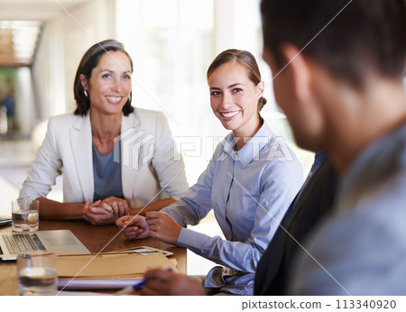 Teamwork, women or happy business people in meeting, discussion, conversation in boardroom office. Smile, colleagues talking or confident employees planning strategy, feedback report or group project 113340920