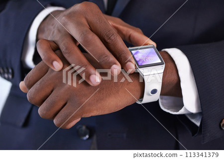 Businessman, hand and smart watch on wrist with display, online schedule and digital agenda for job. Black person, suit and technology with homescreen on arm for network, application and check time Businessman, hand and smart watch on wrist with display, online schedule and digital agenda for job. Black person, suit and technology with homescreen on arm for network, application and check time 113341379