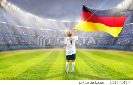 Germany football team supporter on stadium. Germany football team supporter on stadium. 113341454