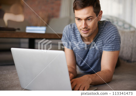 House, remote work and man on floor with laptop for working from home, freelance job and career. Business, startup and person on computer for typing email, planning or internet research on website 113341473