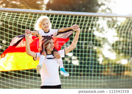 Germany football fan kids. Children play soccer. Germany football fan kids. Children play soccer. 113341559