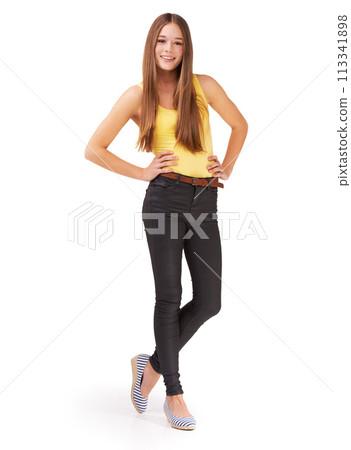 Fashion, confident and portrait of girl on a white background for positive attitude, happy and style. Hands on hips, youth and isolated teenager in trendy clothes, casual outfit and stylish in studio 113341898