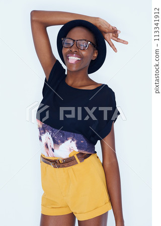 Fashion, peace sign and black woman on a white background in trendy, stylish and casual clothes. Hand emoji, hipster style and isolated person with tongue out, glasses and cool accessory in studio Fashion, peace sign and black woman on a white background in trendy, stylish and casual clothes. Hand emoji, hipster style and isolated person with tongue out, glasses and cool accessory in studio 113341912