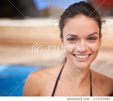 Summer, holiday and portrait of woman in pool with happiness outdoor on vacation in Florida. Person, relax and enjoy sunshine in Miami at hotel or home for swimming in water for fun with wellness 113342085