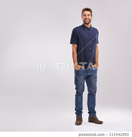 Creative, businessman and portrait of fashion in studio, background and mockup with confidence. Happy, man and relax in jeans with pride or casual style in business as art director or entrepreneur 113342093