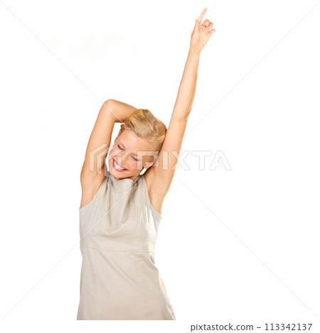 Happy, dance and woman winning in studio for celebration, success and achievement or freedom. Young winner, person or model with energy, excited and yes for news or announcement on a white background 113342137