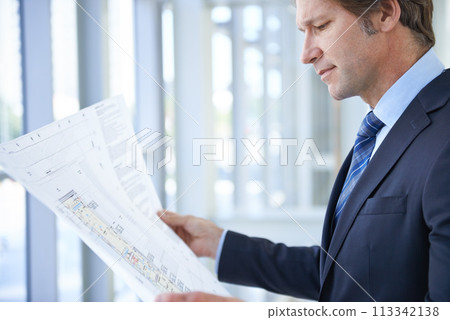 Engineering blueprint, architecture and man in office with papers for planning, building project and property. Real estate, contractor and person with document, idea or drawing for floor plan 113342138