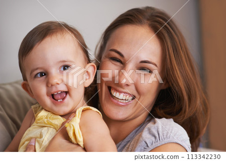 Mother, baby and smile in embrace at home, love and together for bonding in childhood. Mommy, daughter and support for happy toddler in child development, mama and security or connection on sofa Mother, baby and smile in embrace at home, love and together for bonding in childhood. Mommy, daughter and support for happy toddler in child development, mama and security or connection on sofa 113342230