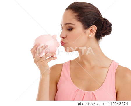 Kiss, piggy bank and woman in studio for budget, finance or investment safety. Face, container or person with money box for savings, income or security of future profit isolated on a white background Kiss, piggy bank and woman in studio for budget, finance or investment safety. Face, container or person with money box for savings, income or security of future profit isolated on a white background 113342374