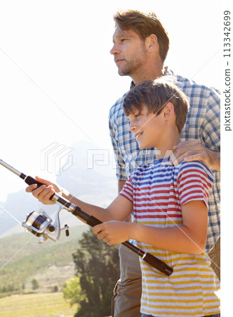 Fishing, pole or father and son in nature for travel, bonding and vacation, holiday or trip. Fish, line and kid with dad outdoor with love, learning or sustainable living while camping in a forest 113342699
