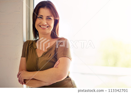 Woman, portrait and relax in home on weekend, smile and comfortable or happy in living room. Female person, confident and positive attitude or satisfaction, mockup space and morning in apartment 113342701