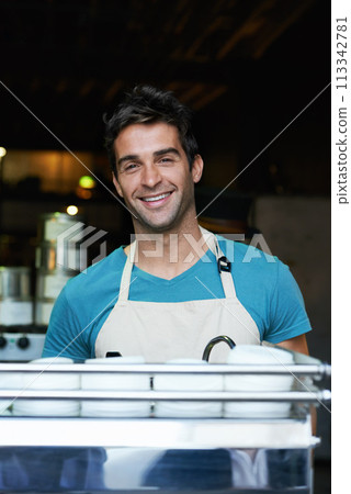 Portrait, smile and man in cafe with coffee machine with pride for small business owner in hospitality. Service, waiter or happy barista in restaurant with confidence, face and entrepreneur in store. 113342781