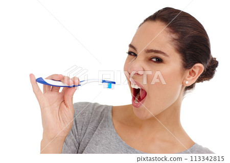 Woman, toothbrush and portrait in studio for dental hygiene, oral care or healthcare. Person, teeth and cleaning for whitening, protection or fresh breath teaching vitality, wellness and wellbeing 113342815