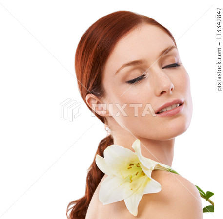 Beauty, skincare and woman with flower, lily and natural isolated on a white studio background mockup space. Floral cosmetics, organic and model with eyes closed for glow, wellness or facial makeup 113342842