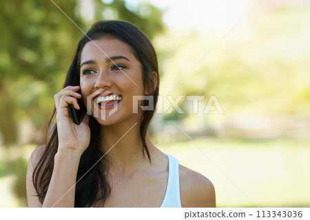 Phone call, smile and woman in a park, conversation and happiness with network and speaking. Person, outdoor and girl with a cellphone and summer with communication and cheerful with a contact or app 113343036