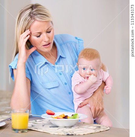Woman, baby and home with breakfast, tired and fatigue with fruit, orange juice and anxiety. Single mom, child and morning with stress, meal and home for routine, daughter and love with kids Woman, baby and home with breakfast, tired and fatigue with fruit, orange juice and anxiety. Single mom, child and morning with stress, meal and home for routine, daughter and love with kids 113343173