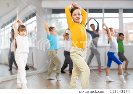Group of children dancing contemporary dance Group of children dancing contemporary dance 113343174