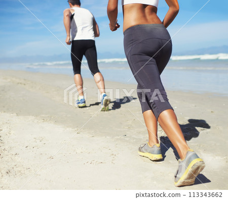 Running, beach and man with woman, fitness and cardio with workout and training for wellness. Healthy, runner and athlete with practice and vacation with water and waves with sunshine or getaway trip 113343662