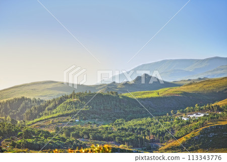 Mountains, environment and blue sky with nature, countryside and sunshine with landscape or weekend break. Empty, valley or grass with flowers or vacation with summer or travel with holiday or spring Mountains, environment and blue sky with nature, countryside and sunshine with landscape or weekend break. Empty, valley or grass with flowers or vacation with summer or travel with holiday or spring 113343776