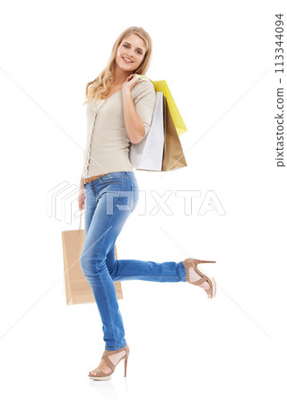 Shopping bag, woman is happy with retail and fashion, customer in studio and sale on white background. Discount purchase at store, gift and smile in portrait with commercial product from market Shopping bag, woman is happy with retail and fashion, customer in studio and sale on white background. Discount purchase at store, gift and smile in portrait with commercial product from market 113344094