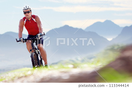 Nature, exercise and man cyclist with bicycle in park for marathon, race or competition training. Fitness, sports and male athlete cycling on bike for cardio health workout outdoor by mountain. Nature, exercise and man cyclist with bicycle in park for marathon, race or competition training. Fitness, sports and male athlete cycling on bike for cardio health workout outdoor by mountain. 113344414