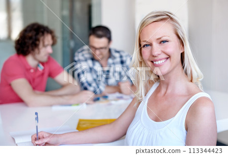 Portrait, happy business woman writing at table in meeting and coworking in office, creative company or workplace. Face, smile and writer on book, employee or person at startup job or career at desk Portrait, happy business woman writing at table in meeting and coworking in office, creative company or workplace. Face, smile and writer on book, employee or person at startup job or career at desk 113344423